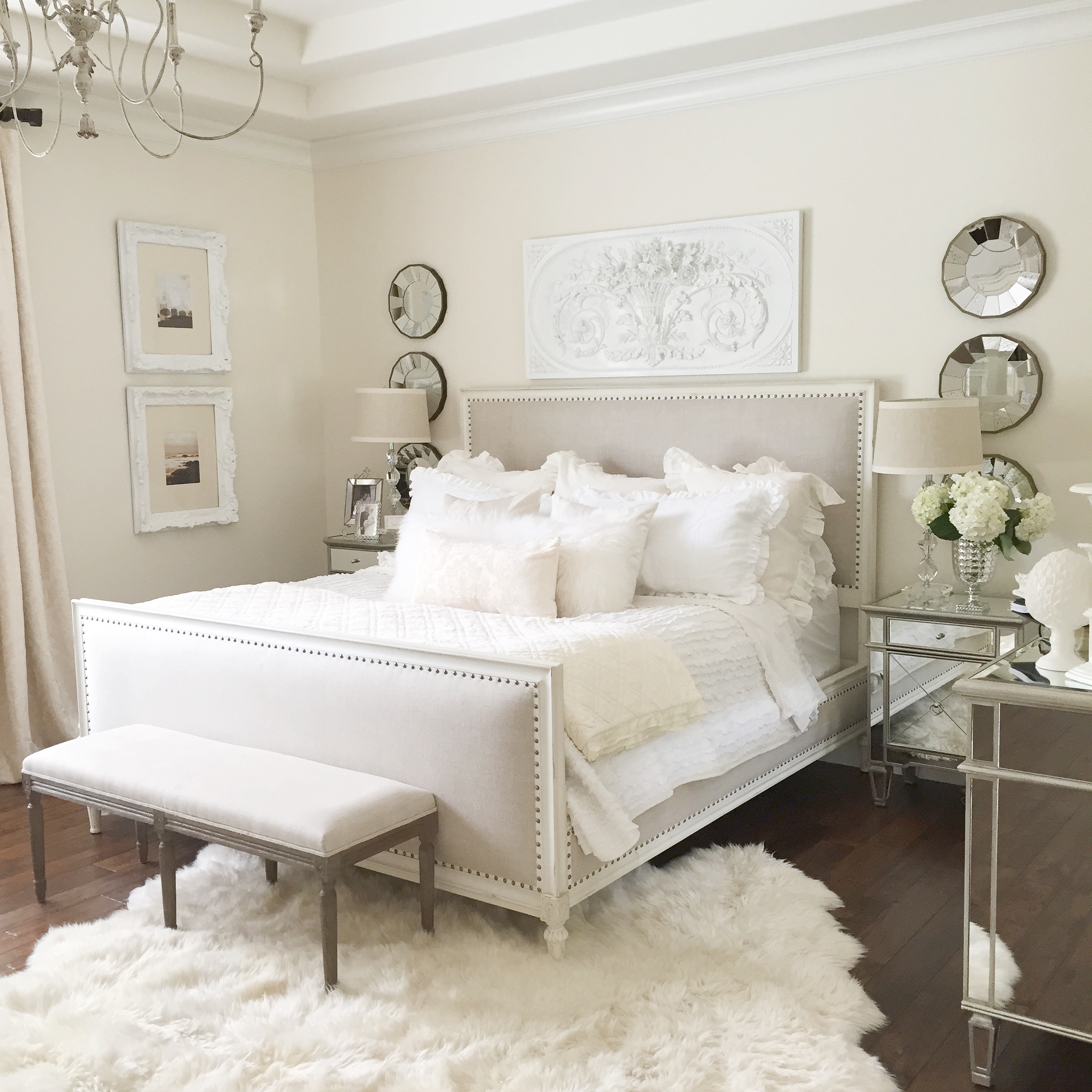 neutral easy master bedroom with restoration hardware bed, white wall, mirrored furniture, fur rug make over