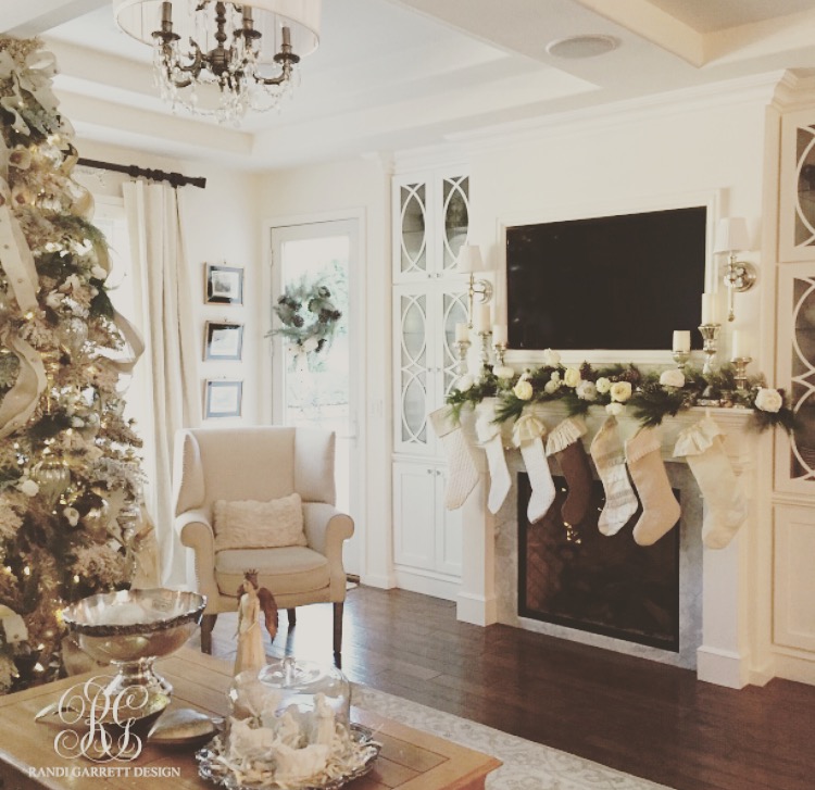 Elegant Christmas family room with flocked Christmas tree by Randi Garrett Designs