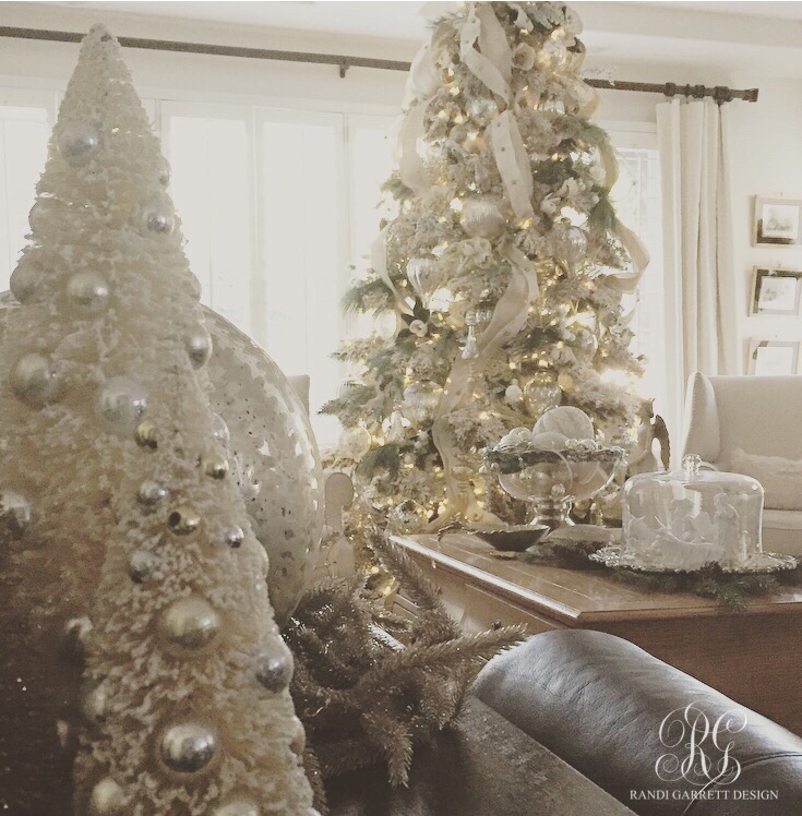 Elegant Christmas family room with flocked Christmas tree by Randi Garrett Designs