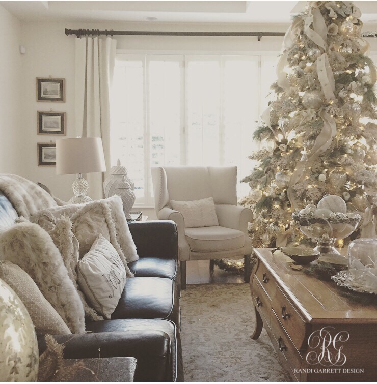 Elegant Christmas family room with flocked Christmas tree by Randi Garrett Designs