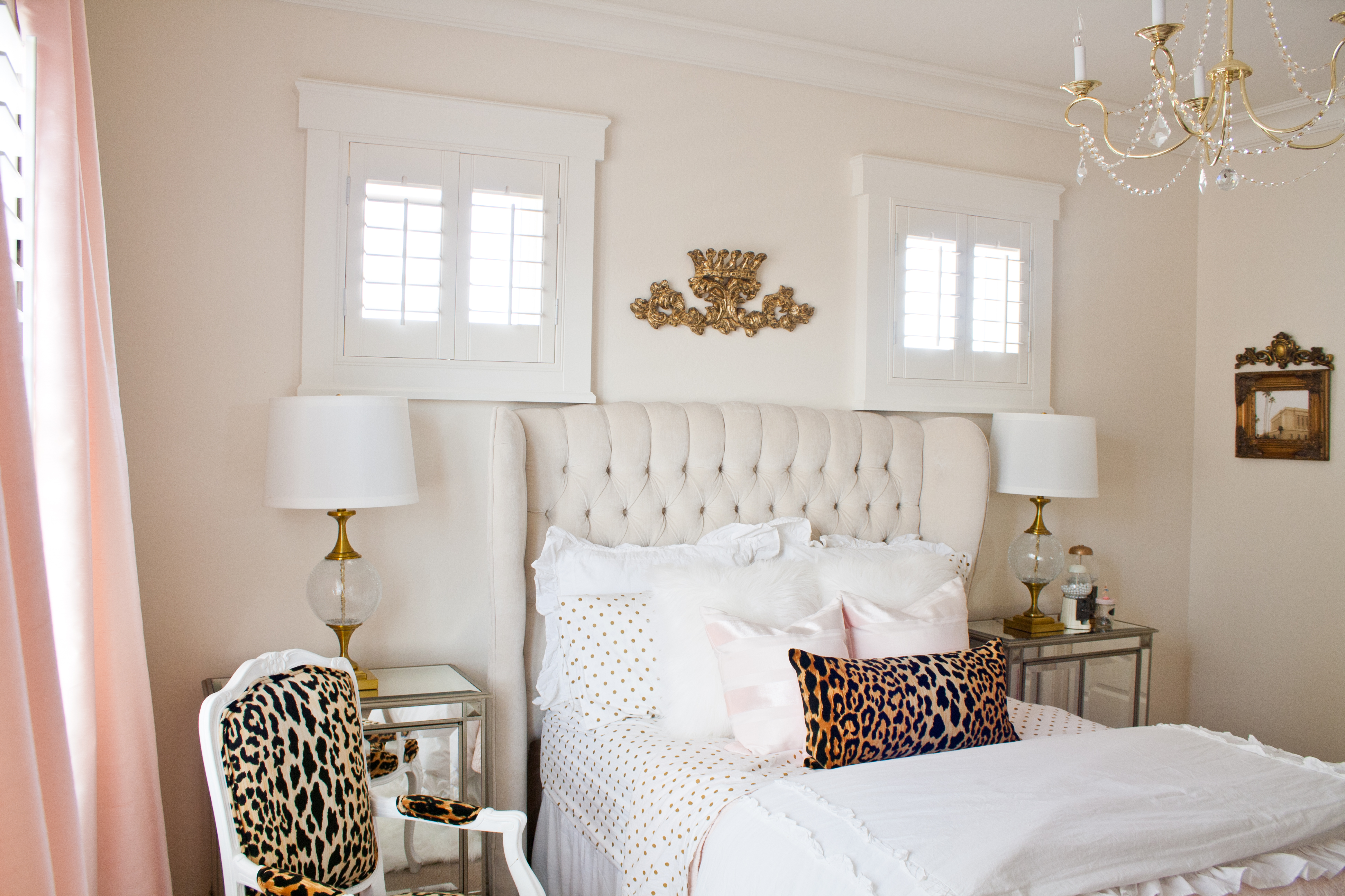 Pink and gold bedroom by Randi Garrett Design with leopard chair