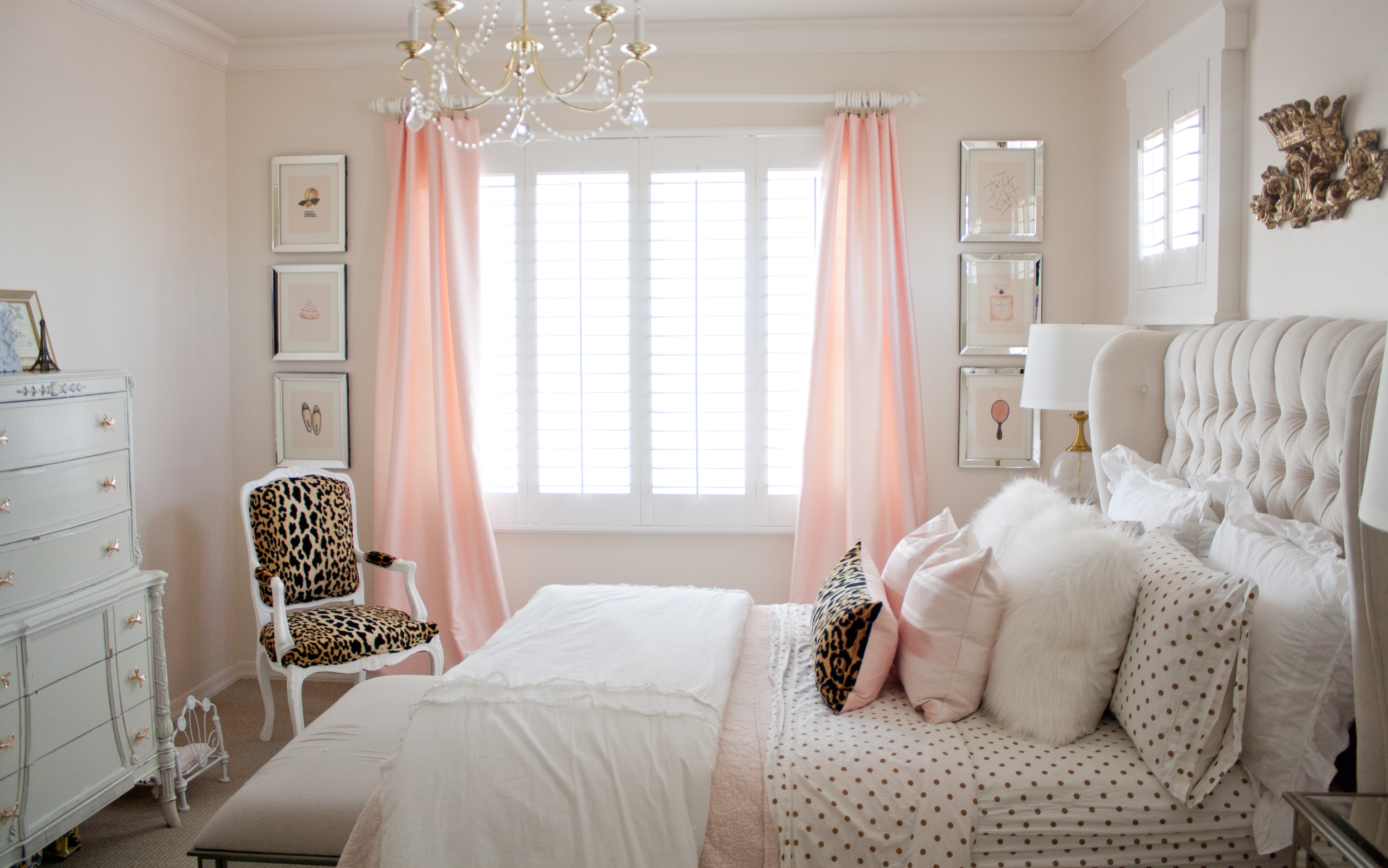 Pink and gold bedroom by Randi Garrett Design, using PB Teen gold polka dot sheets, RH Baby and Child crown wall plaque and leopard chair 