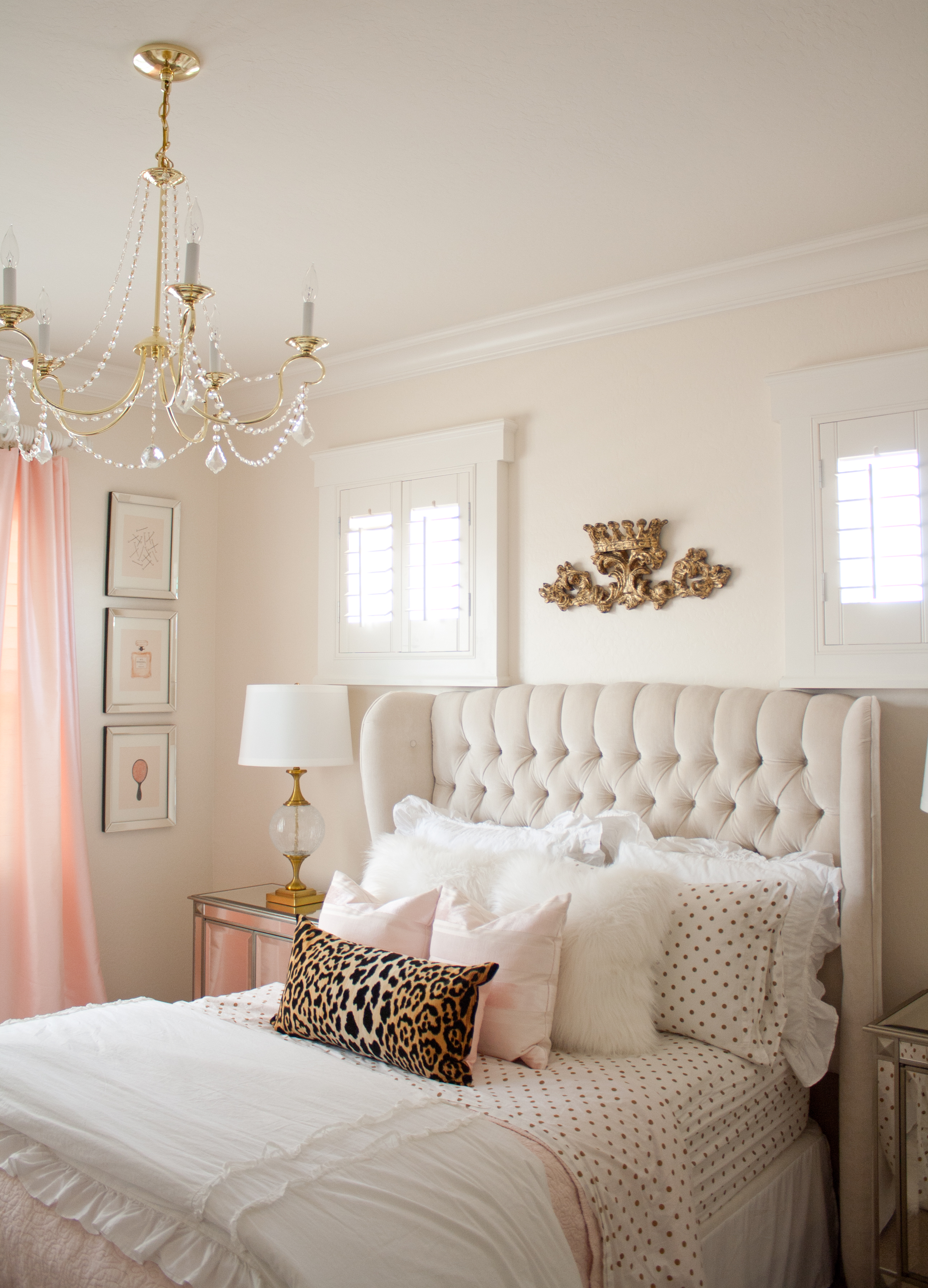 Pink and gold bedroom by Randi Garrett Design with gold polka dot sheets from PB Teen