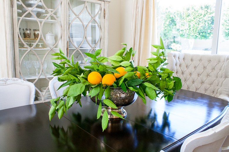 Easy centerpiece with oranges. Dining room styled by Randi Garrett Design