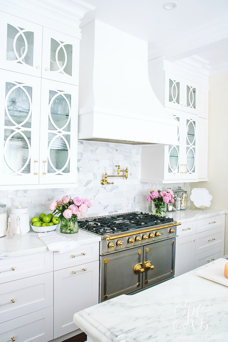 Girlfriend's Guide to Marble Countertops -white kitchen with marble countertops