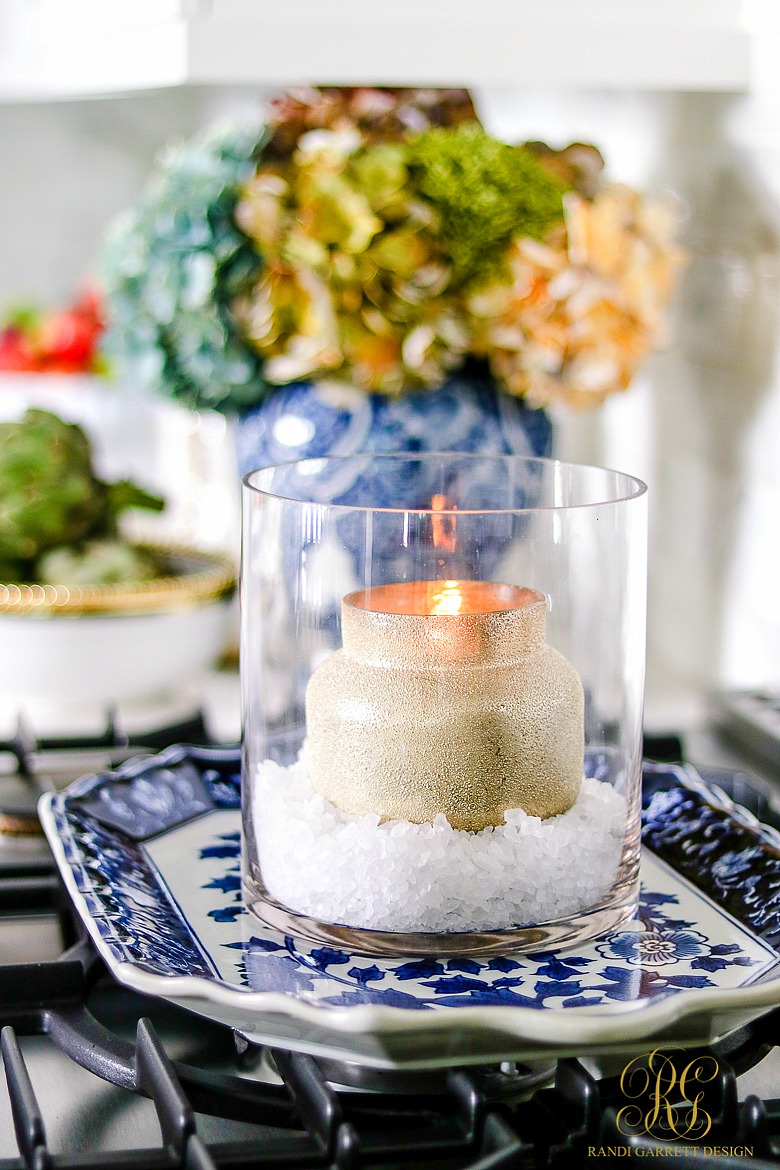 Candle styling tips - gold candle in hurricane