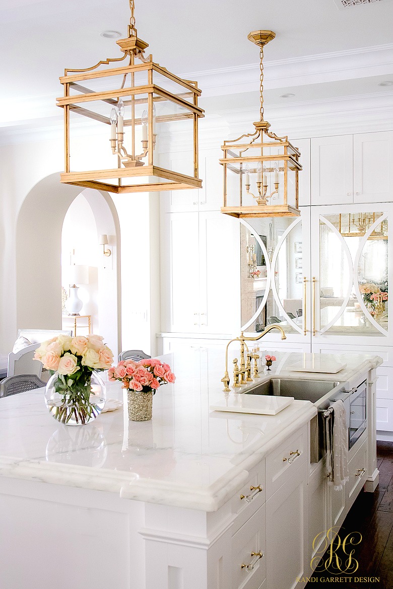 transitional white kitchen - gold lanterns