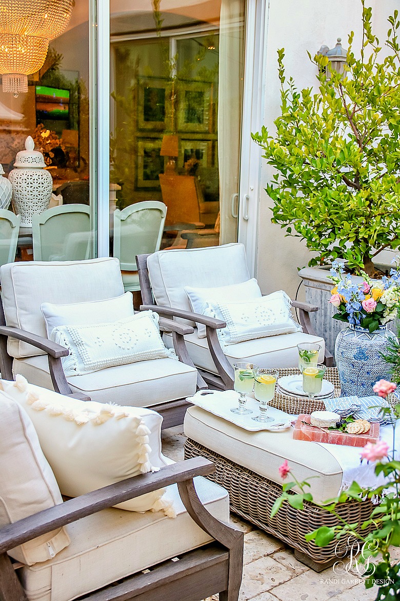 outdoor tassel throw pillows - patio styling ideas for summer