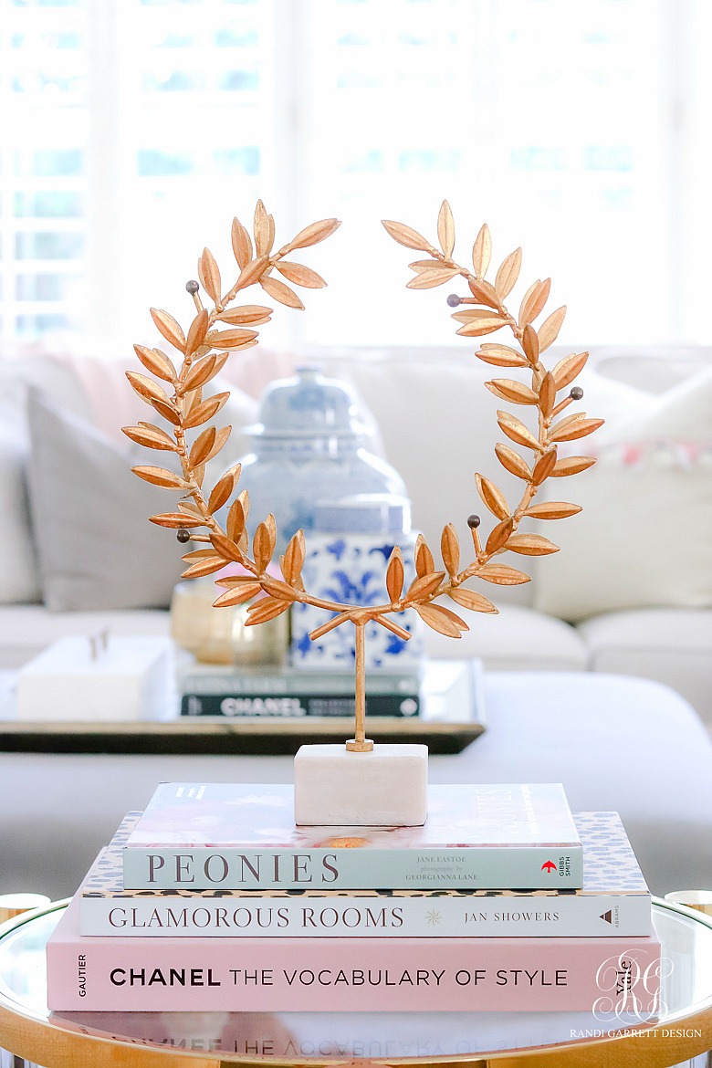 Gold Laurel wreath stand - summer coffee table books - summer decorating tips