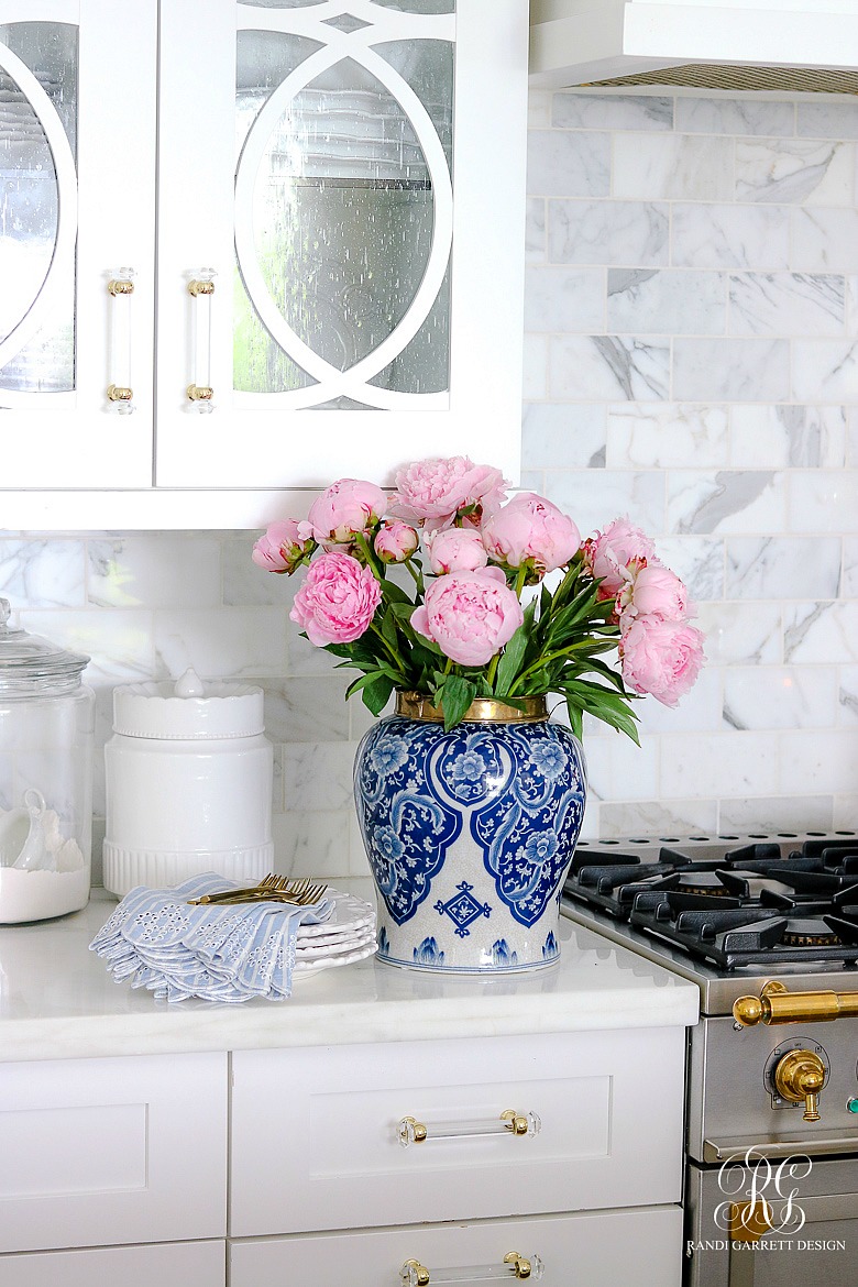 blue and white ginger jar with pink peonies - summer decor ideas