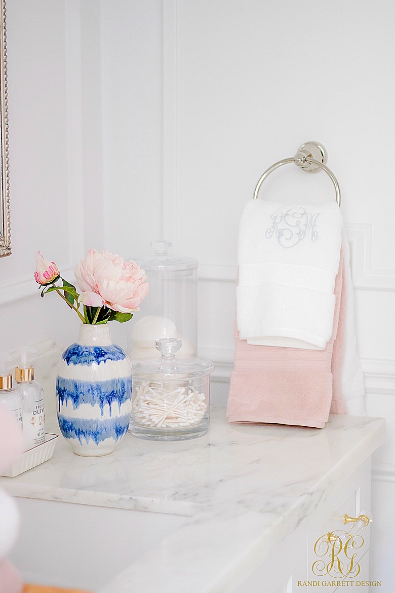 3 Simple Ways to Add Pink to your Home - glam guest bathroom - pink towels
