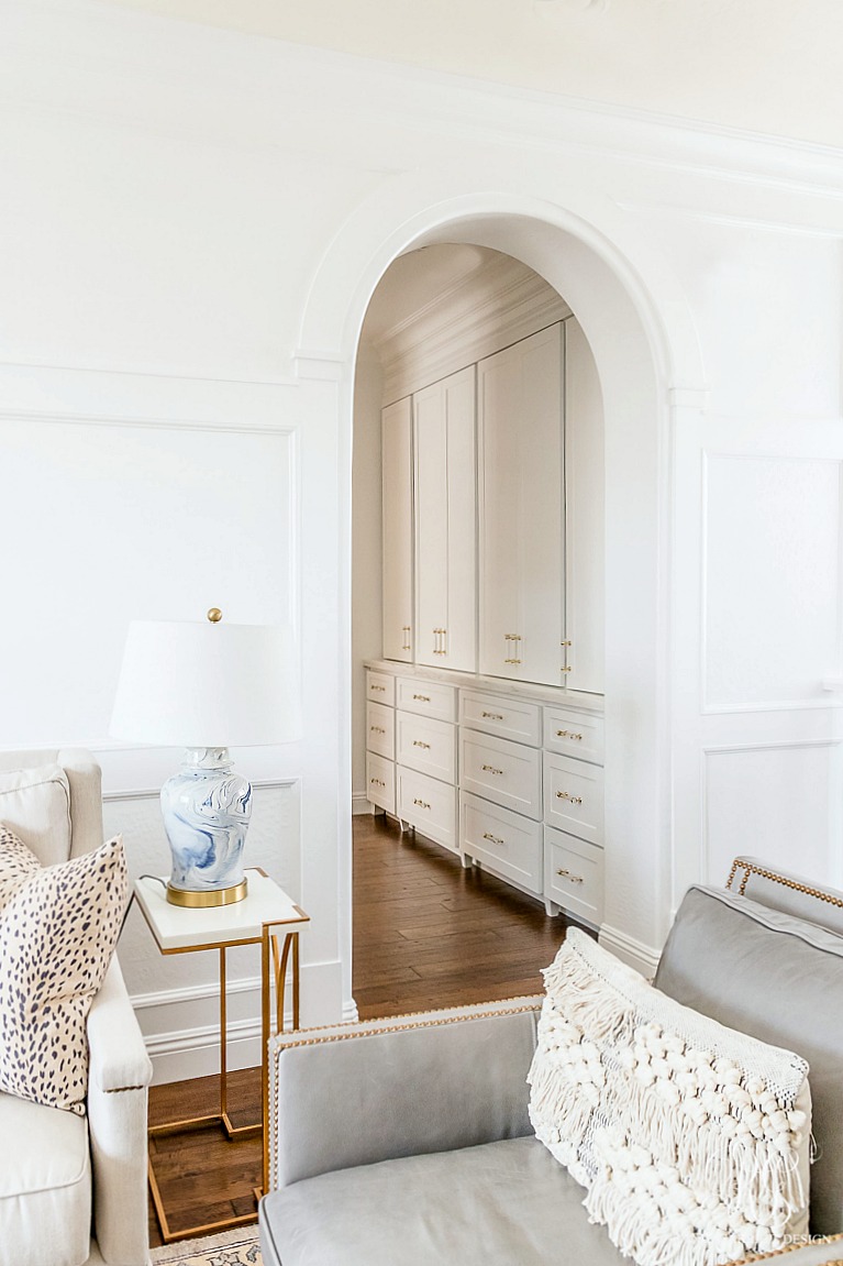 white shaker cabinets - white wainscoting walls - beautiful family room