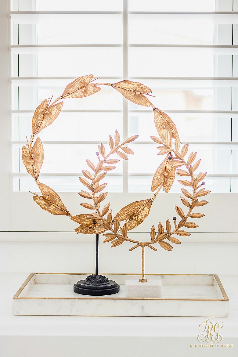 gold laurel wreath stand