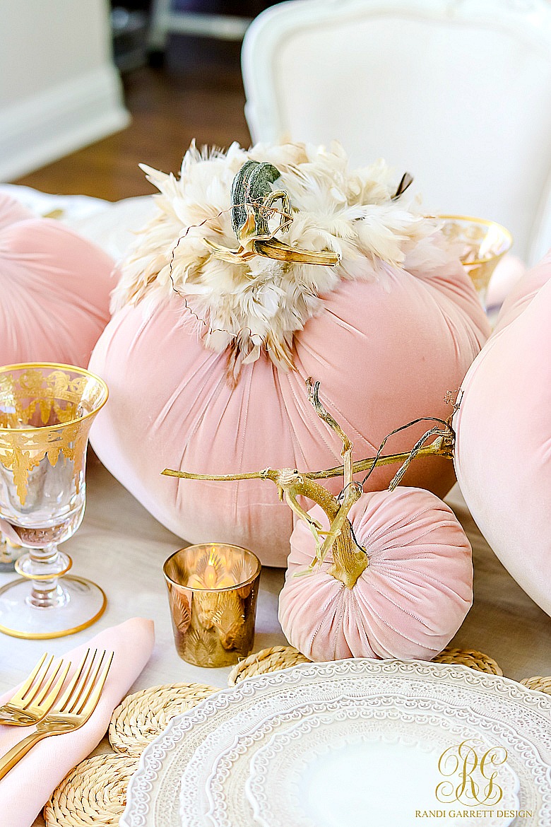 blush velvet pumpkins with feathers