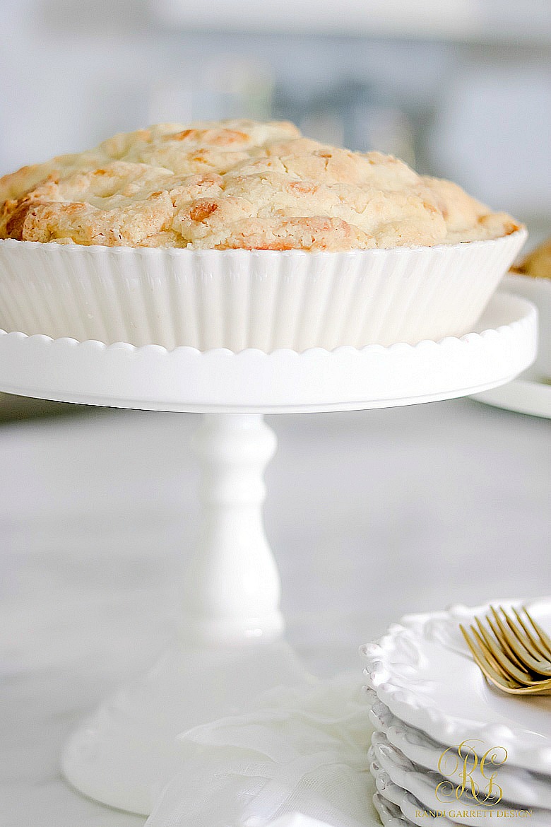 white cake stand - fluted pie dish - apple crisp recipe 