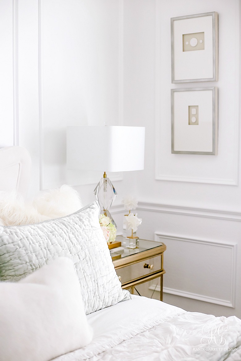 Glam bedroom with mirrored nightstands and lux finishings