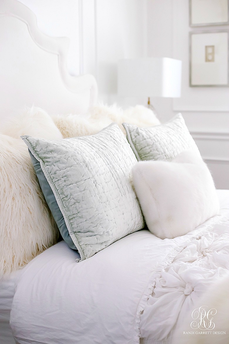 luxe guest bedroom - velvet bedding - fur pillows