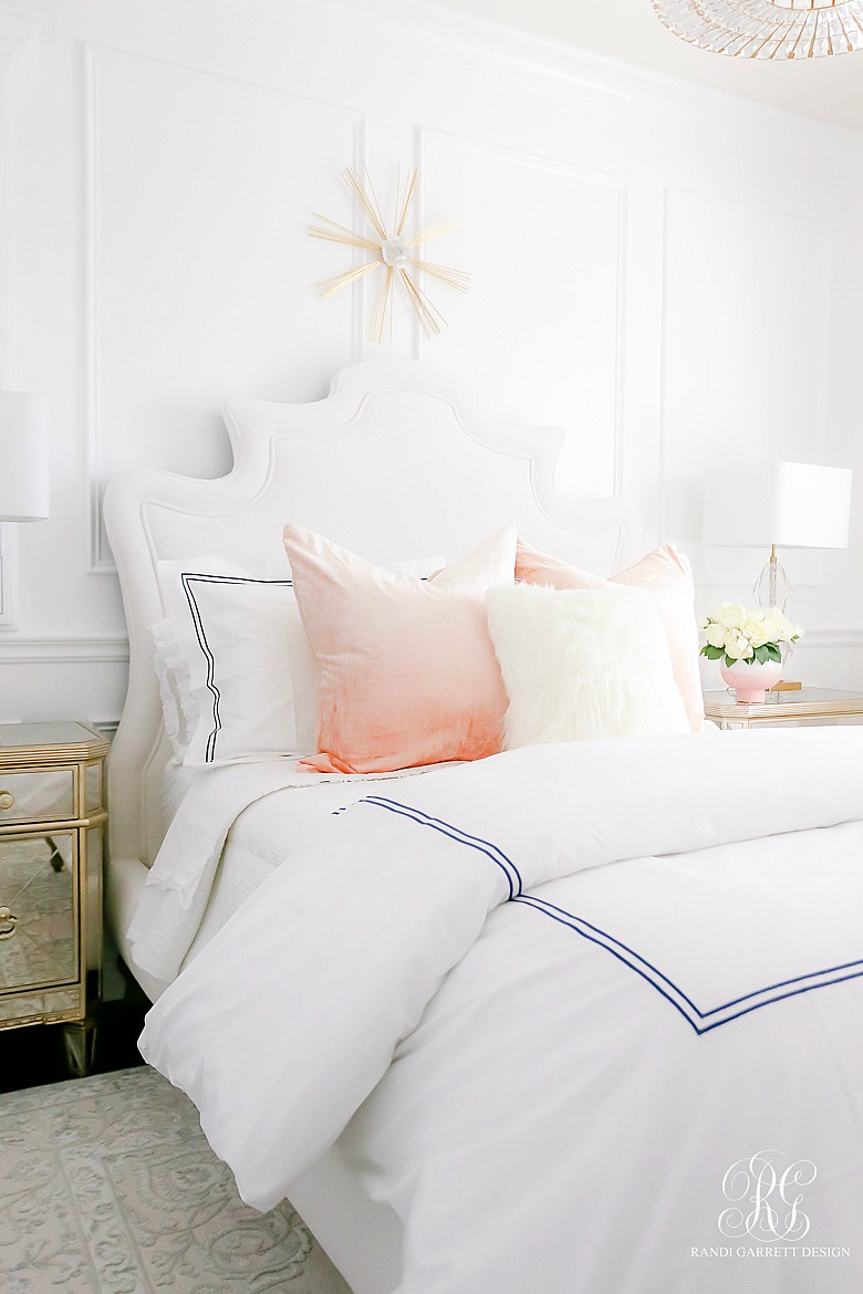 white trim on walls - glam guest bedroom - velvet headboard