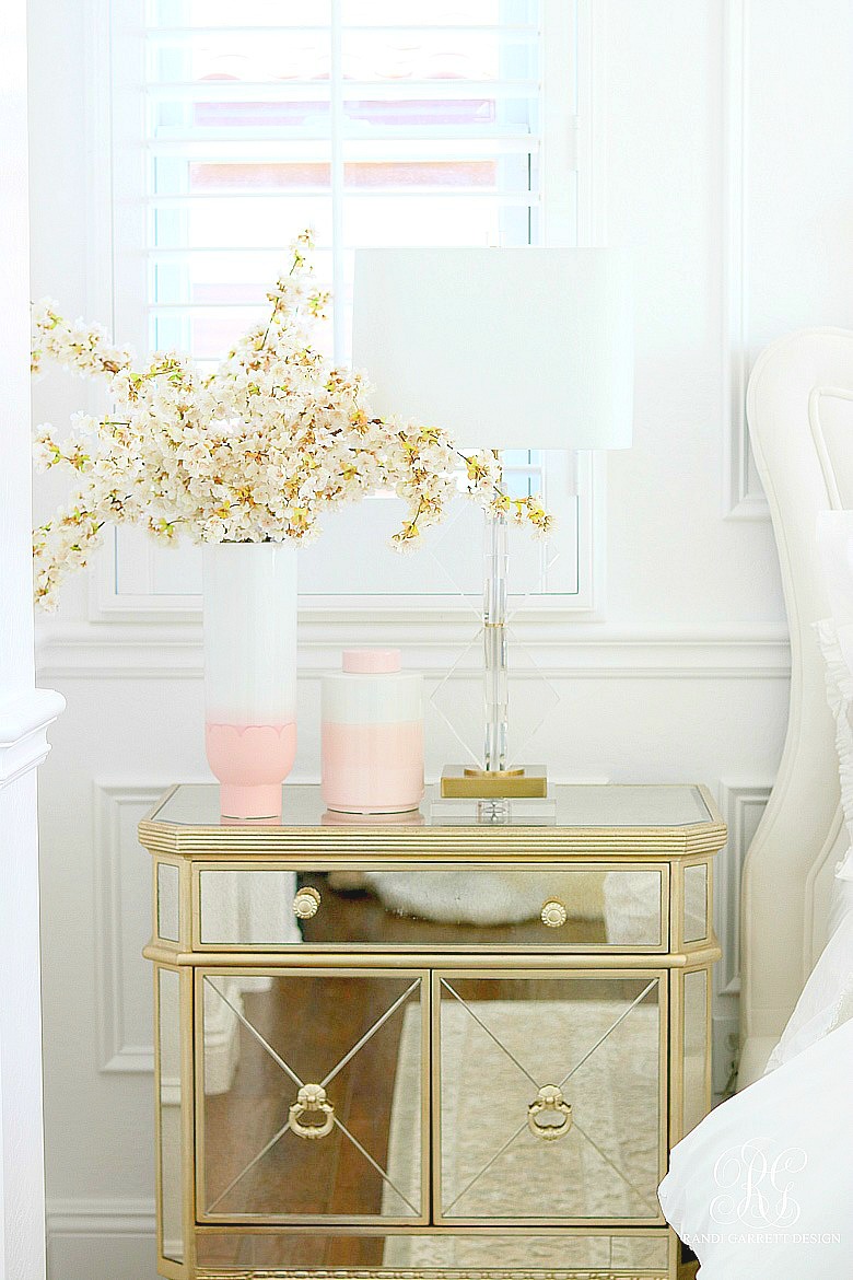 mirrored nightstand - faux cherry blossoms -spring decor ideas
