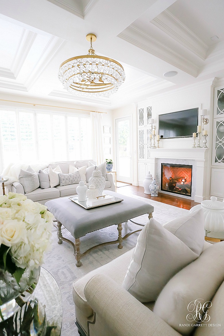 white fireplace with built in cabinets - family room decor