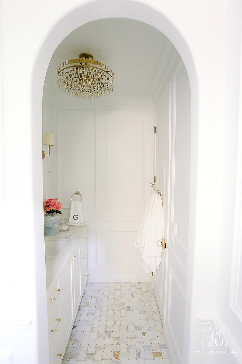 white bathroom with wainscoting 