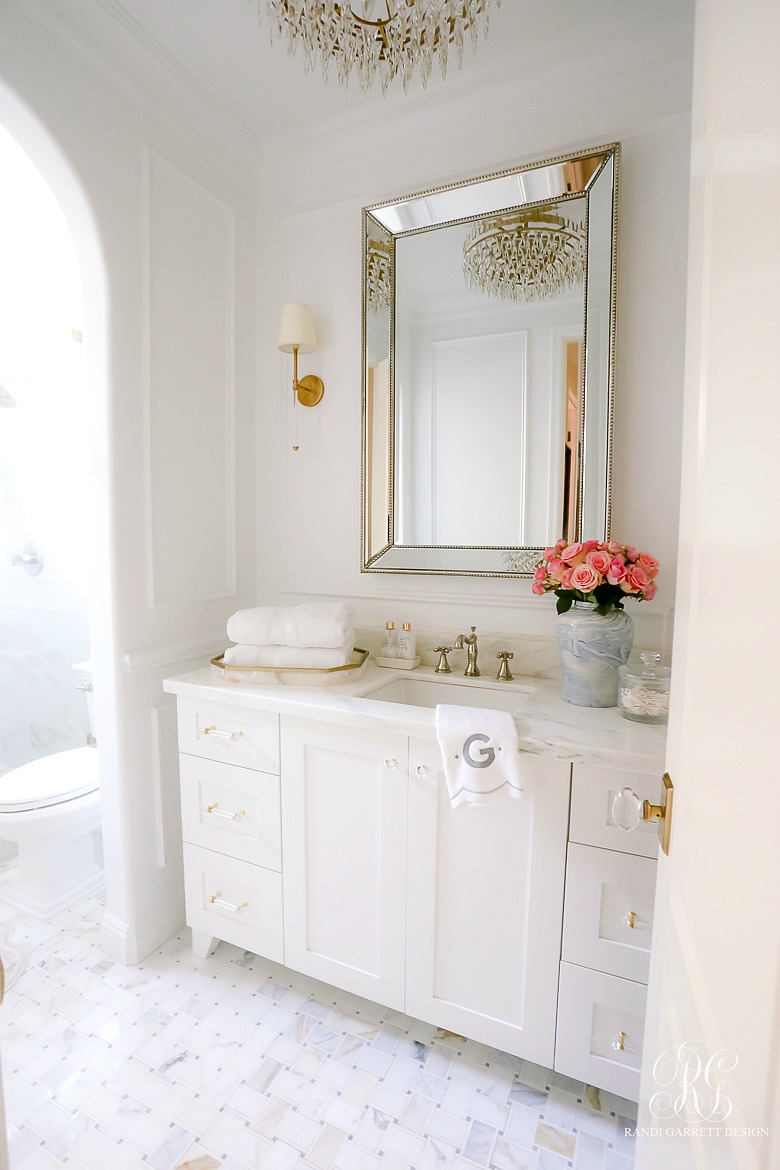 white marble powder bathroom