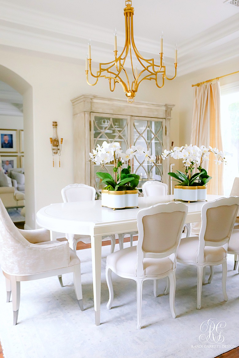 elegant dining room - gold accents - transitional furniture - caracole