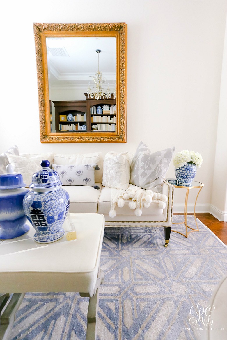 blue and white den with gold accents