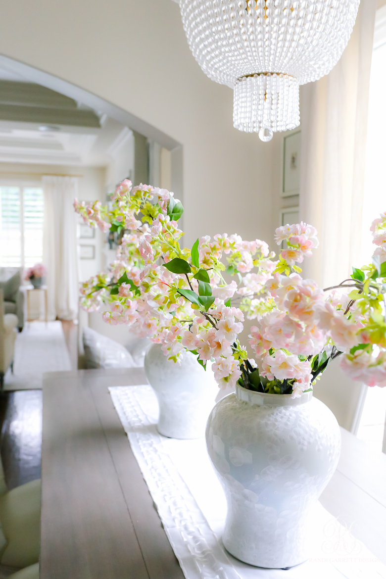 white ginger jars with cherry blooms for spring