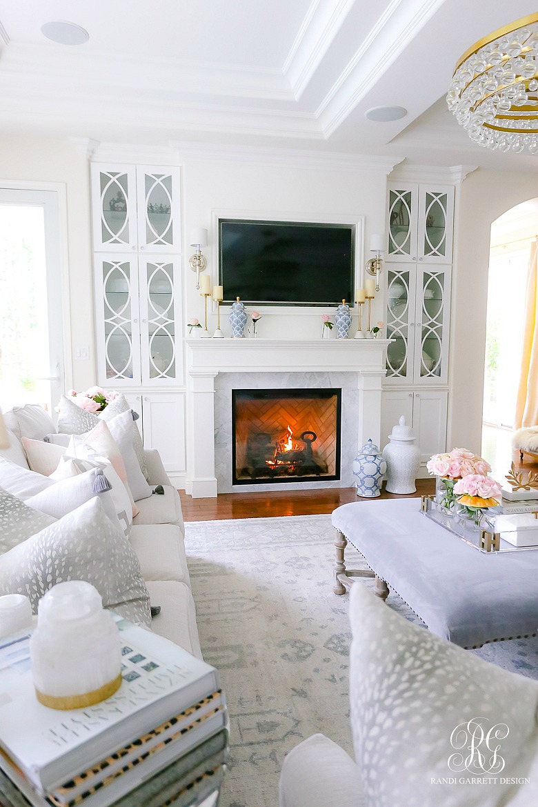 white fireplace - builtins - gas fireplace - spring decor living room