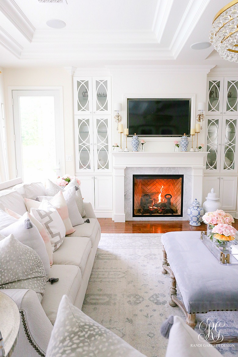 white fireplace with builtin bookcase - family room decor