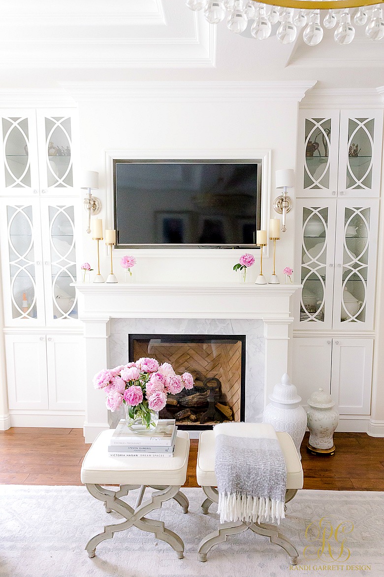 white fireplace mantel builtins decorative doors
