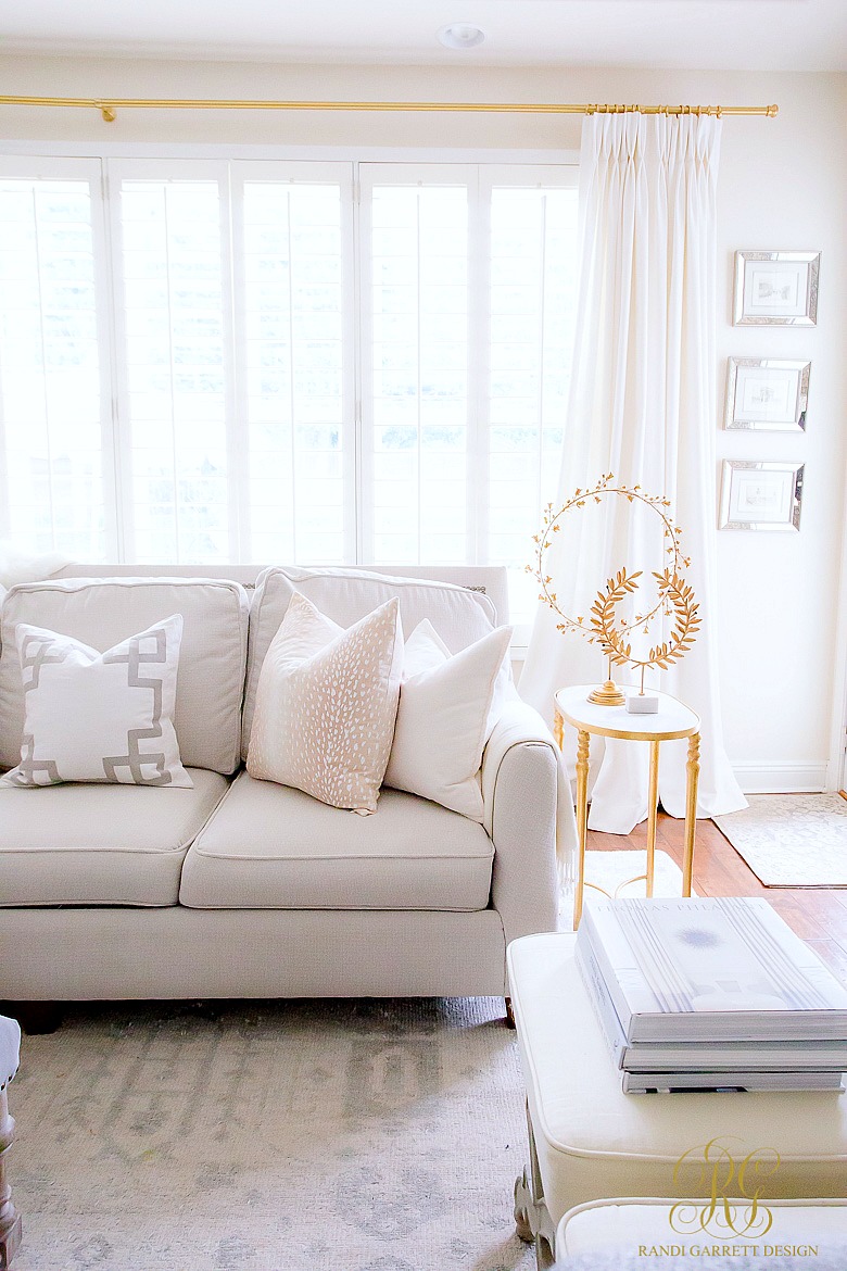 gold laurel wreath stands - beautiful family room 