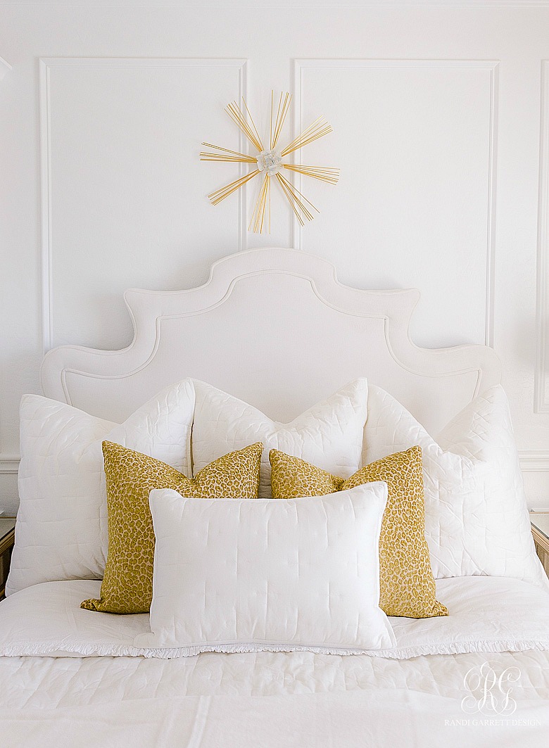 7 Ways to Style Pillows on Your Bed - gold leopard pillows