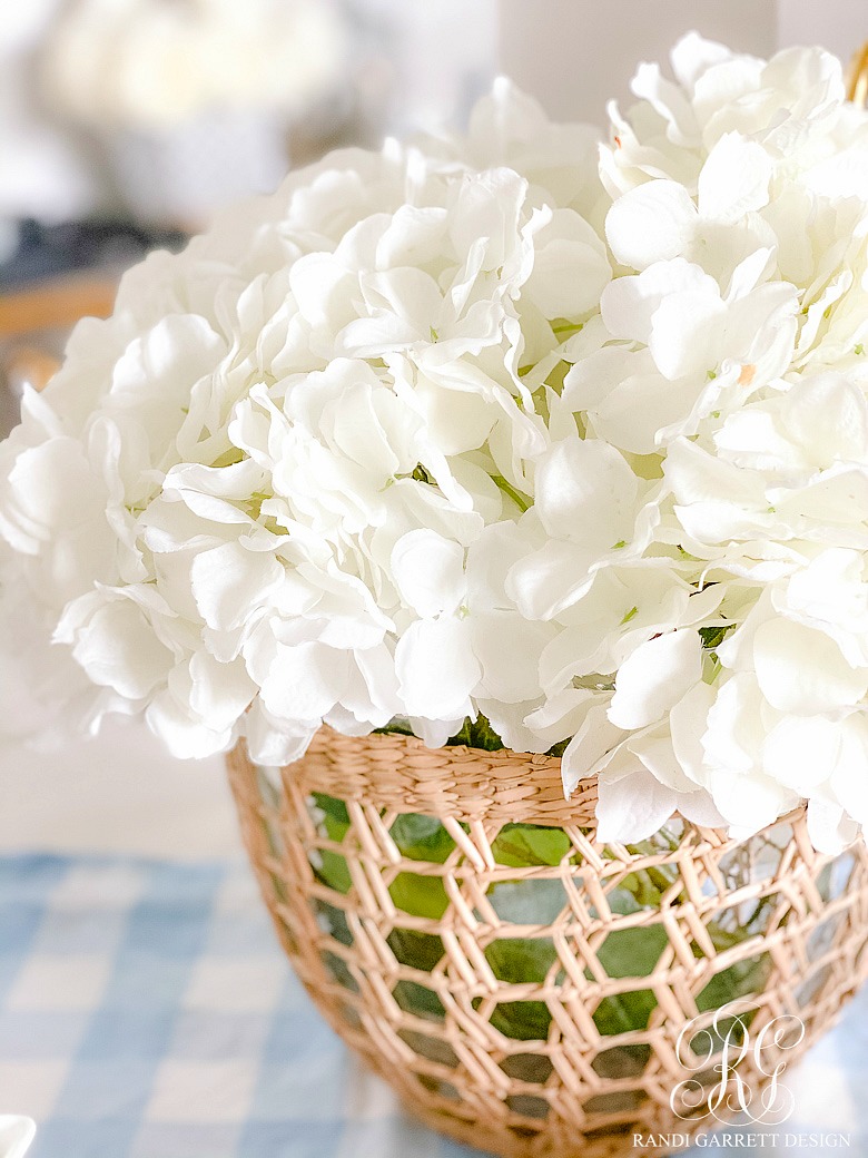 rattan bowl white hydrangeas