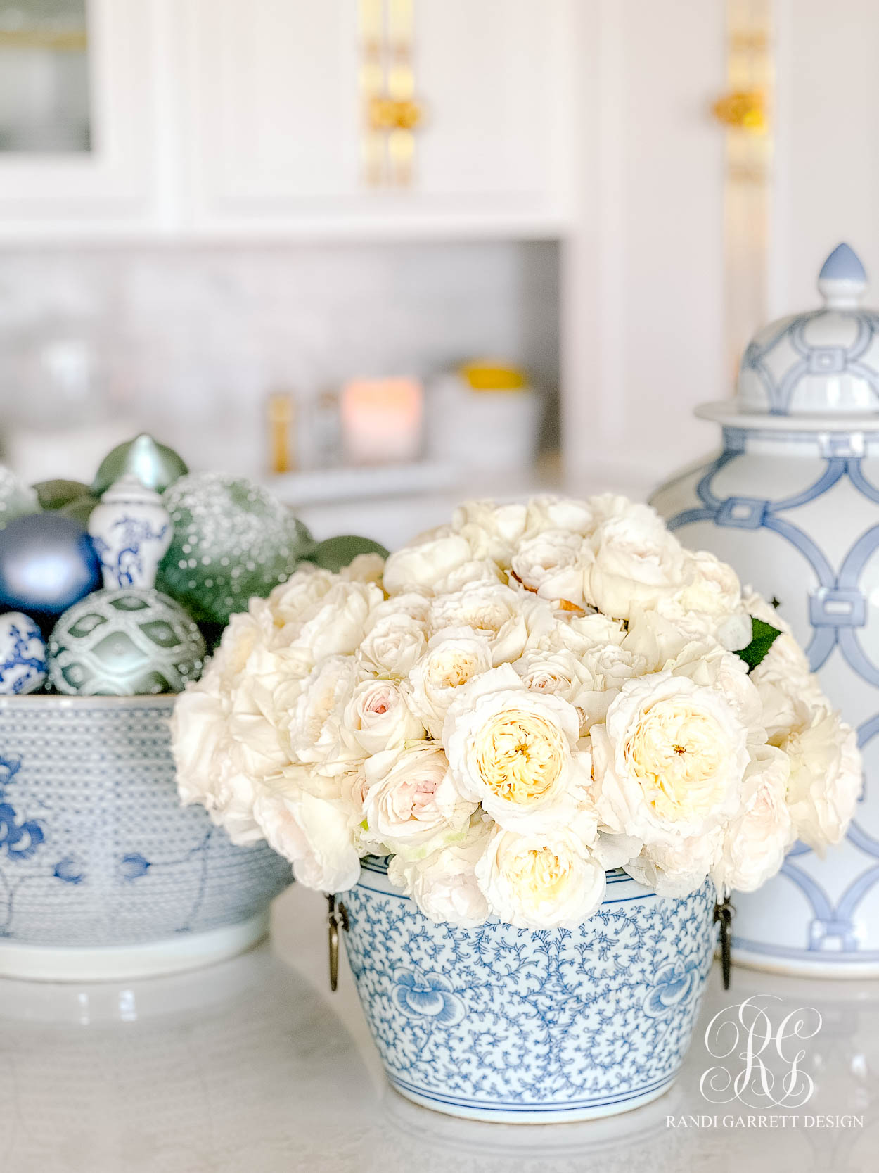 Christmas floral arrangement white roses ginger jars