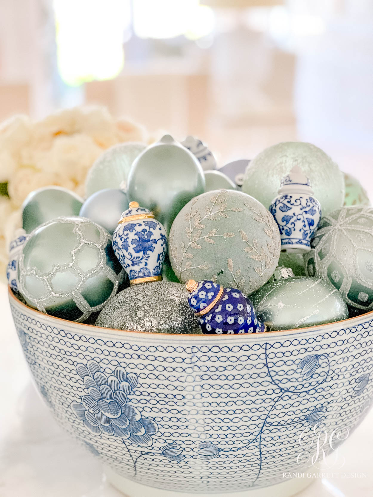 blue white ornament arrangement with ginger jars