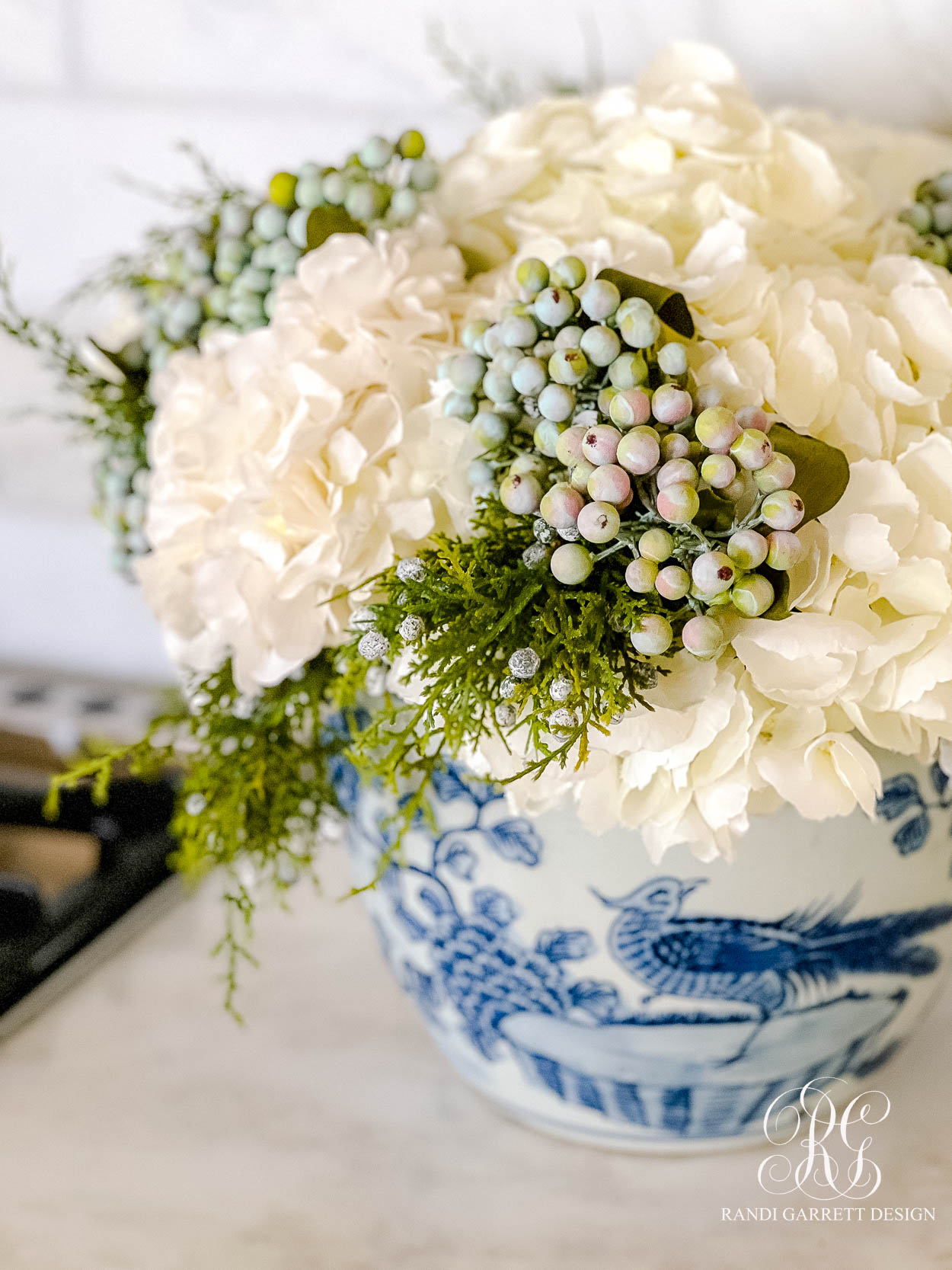 hydrangea berry juniper Christmas floral arrangement