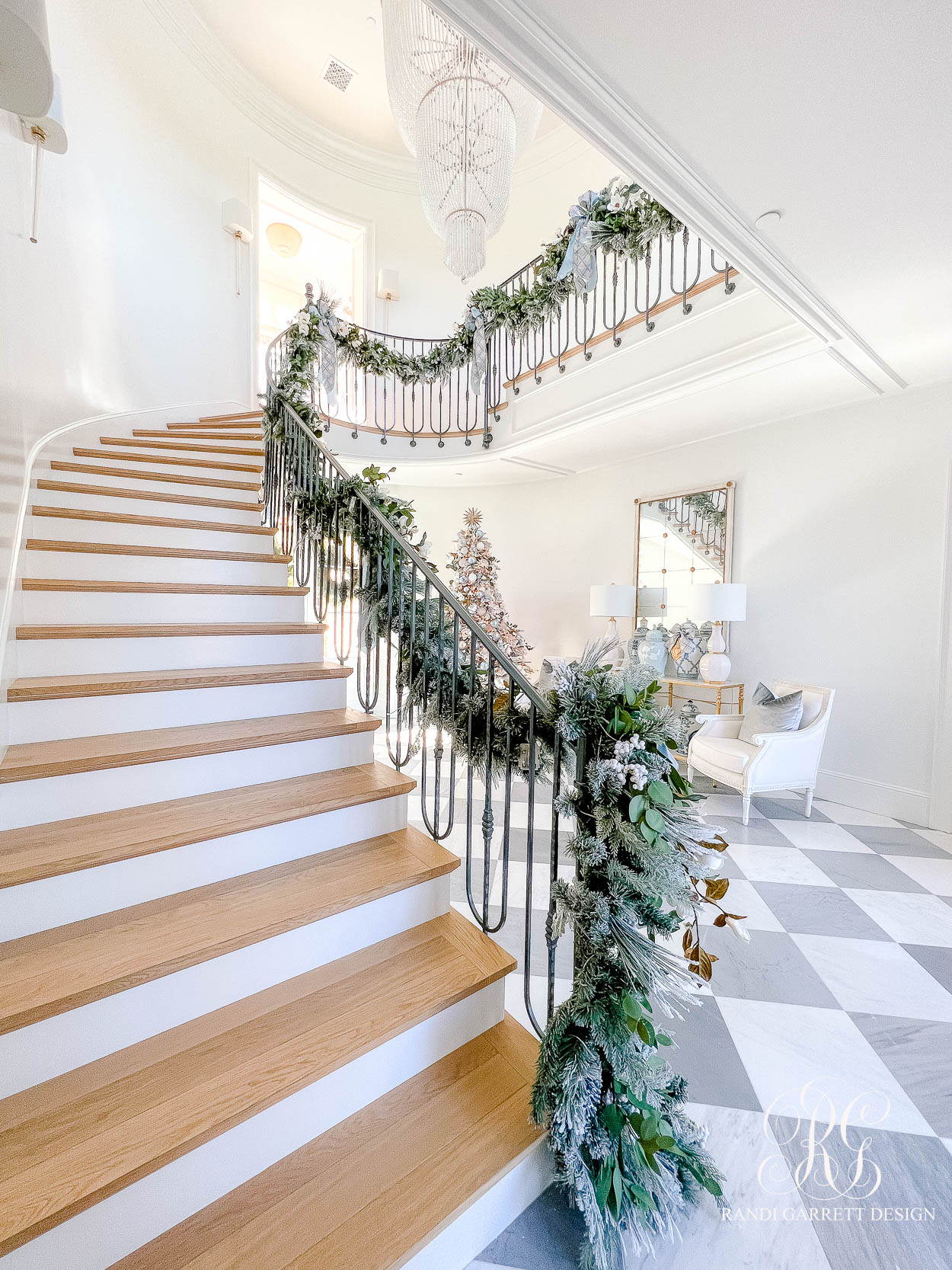 The Wren's Blue + White Christmas Entryway spiral staircase