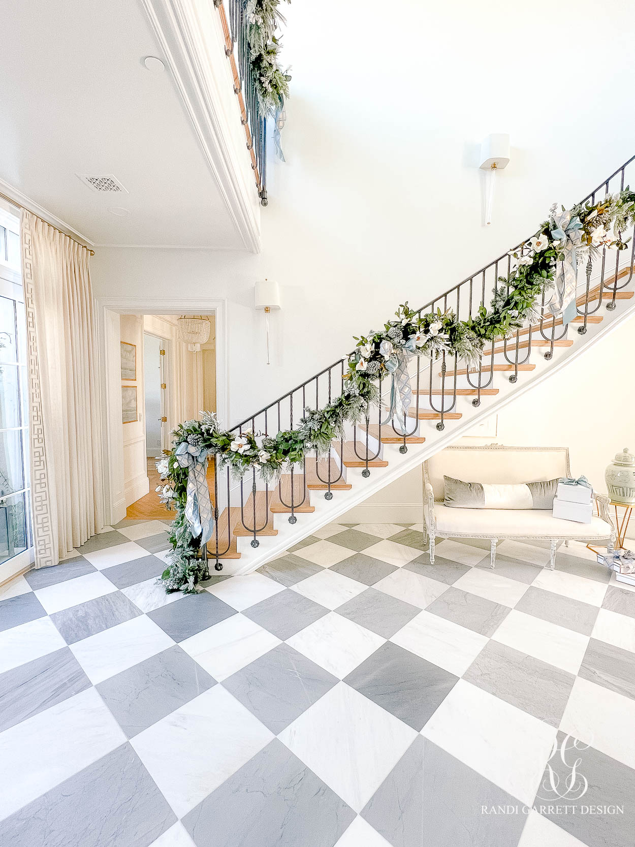 The Wren's Blue + White Christmas Entryway stair garland