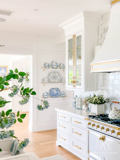 French-Style Shelves with Brass Tipping Rails