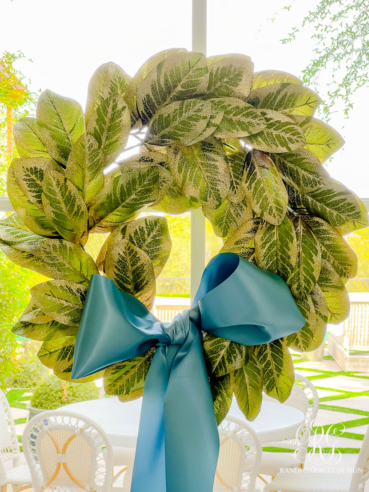 Windows Dressed for the Season: Magnolia Wreaths & Blue Ribbon